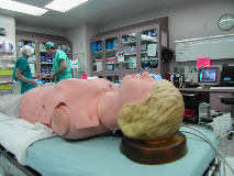 A mannequin is the patient in a surgery scene for Cheyenne Heart Center. 